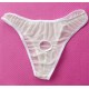 White or Black  Stretch Mesh Thong With Front Hole and Tie Strap.