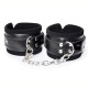 Black Leather Wrist Cuffs With Linking Chain.