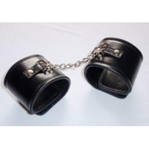 Black Leather Wrist Restrains With a Small Chain.