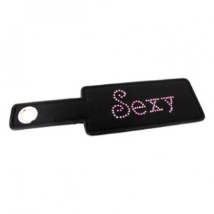 Black Leather Paddle With Word Sexy In Pink Rhinestone.